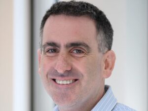 Headshot of smiling middle aged white man